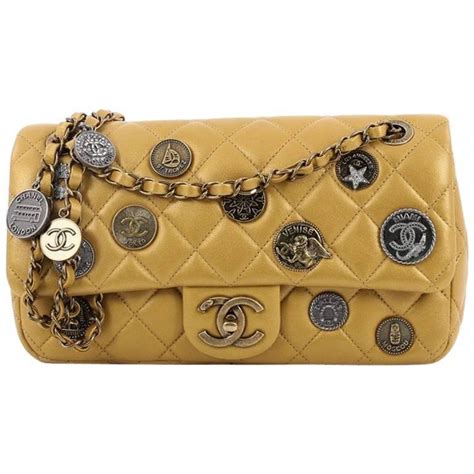 chanel patent with medallion flap bag on chain|history of Chanel flap.